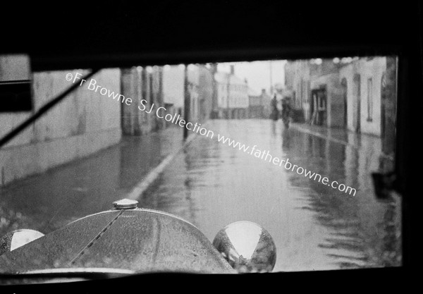 THROUGH WINDSCREEN FLOODED TOWN